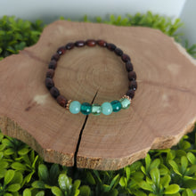 Load image into Gallery viewer, Teal Glass Bead & Wood Diffuser DIY Bracelet Kit