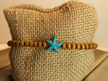 Load image into Gallery viewer, Turquoise Starfish Cross Diffuser Essential Oil Bracelet - Light Wood
