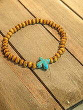Load image into Gallery viewer, Turquoise Quartefoil Cross Diffuser Essential Oil Bracelet - Light Wood
