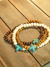 Load image into Gallery viewer, Turquoise Quartefoil Cross Diffuser Essential Oil Bracelet - Light Wood
