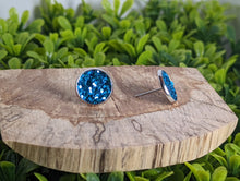 Load image into Gallery viewer, Blue Glitter Faux Leather Stud Earrings
